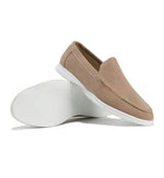 Khaki suede slip-on loafers with white sole and stitched apron detail