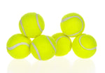 Neon yellow fuzzy tennis balls with white stripes, clustered in front of launcher