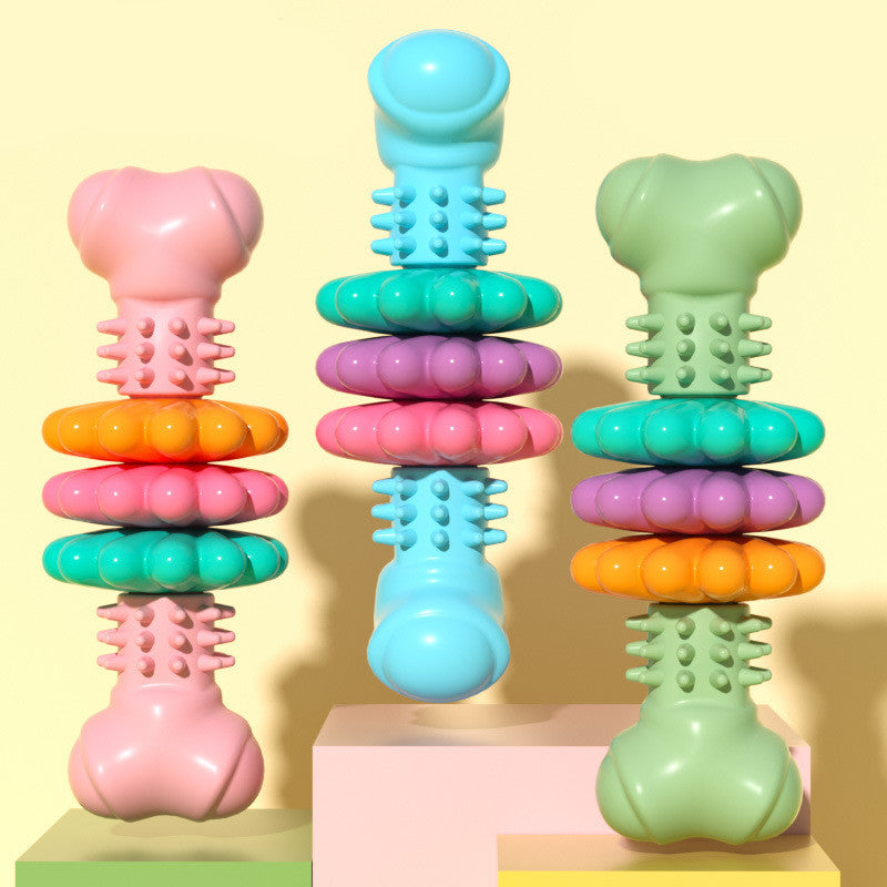 Assorted dog bone chew toys with raised nubs in pink, blue, and green