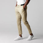 Beige/tan slim-fit business trousers with elastic waist, button fly, straight leg