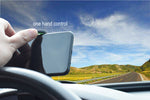 Car phone holder with phone clamp, hand adjusting the top lever, dark body