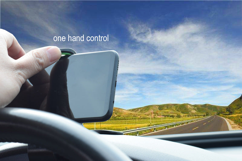 Car phone holder with phone clamp, hand adjusting the top lever, dark body