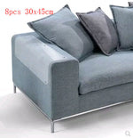 Gray sofa protector pads with clear PVC panels on armrest and cushions