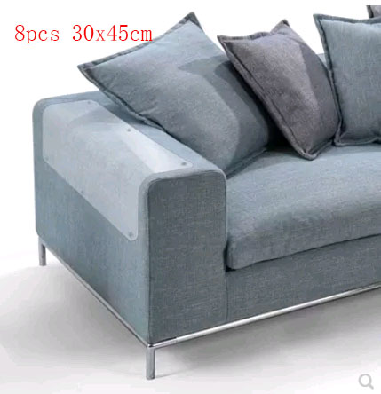 Gray sofa protector pads with clear PVC panels on armrest and cushions