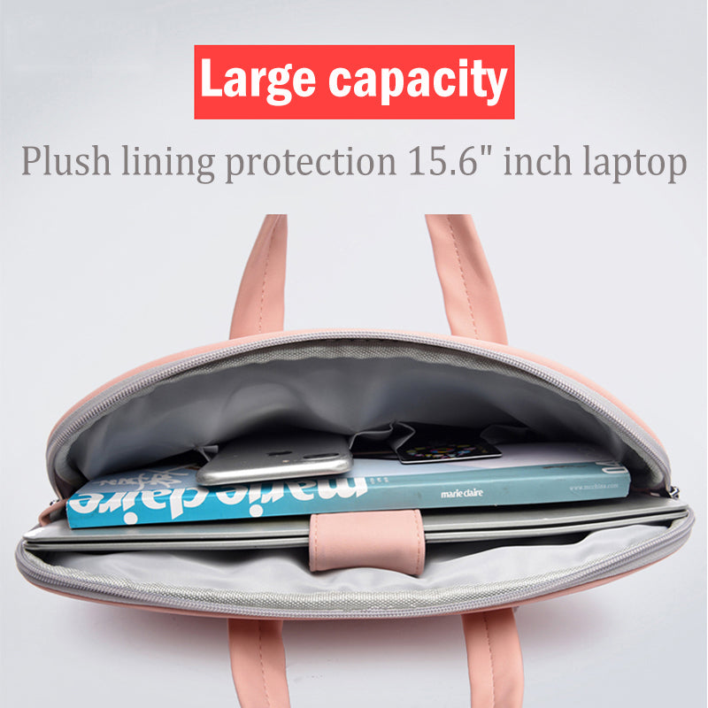 Pink laptop bag with plush-lined interior holding a laptop and notebooks.