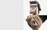 Pet hair clipper blade area showing exposed cutting mechanism on the trimmer