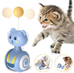 Blue rolling cat teaser toy with yellow ball top and white string spheres
