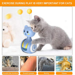 Blue rolling cat teaser toy with yellow ball top and feather wand