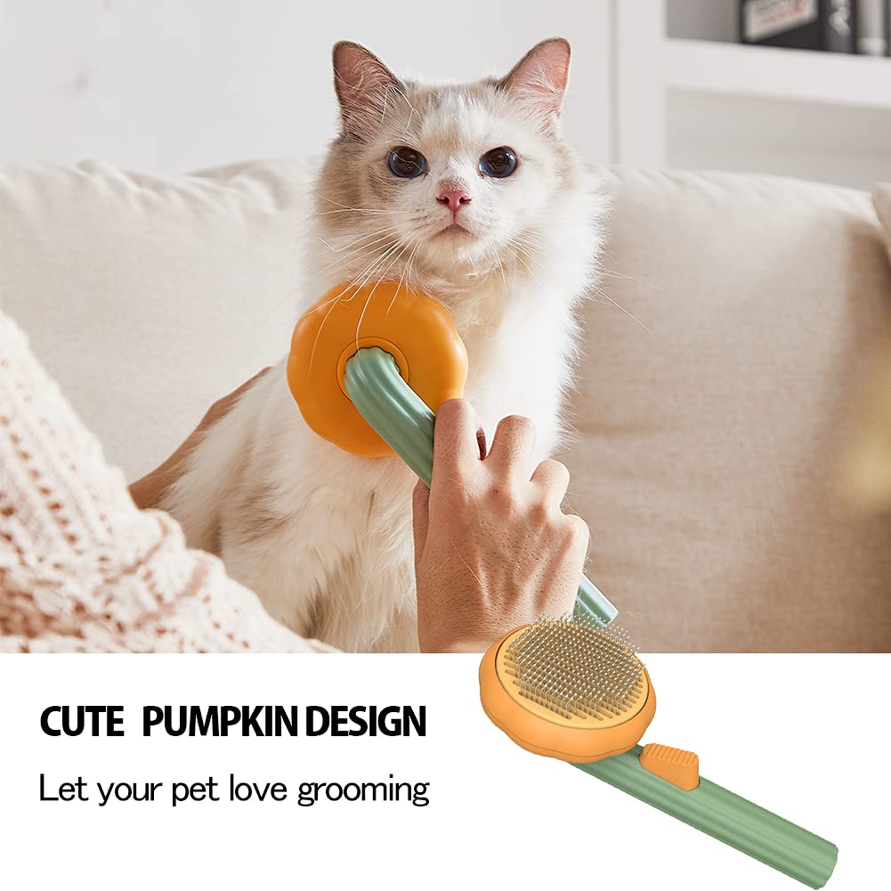 Pet self-cleaning slicker brush with orange head and green handle, used on cat grooming