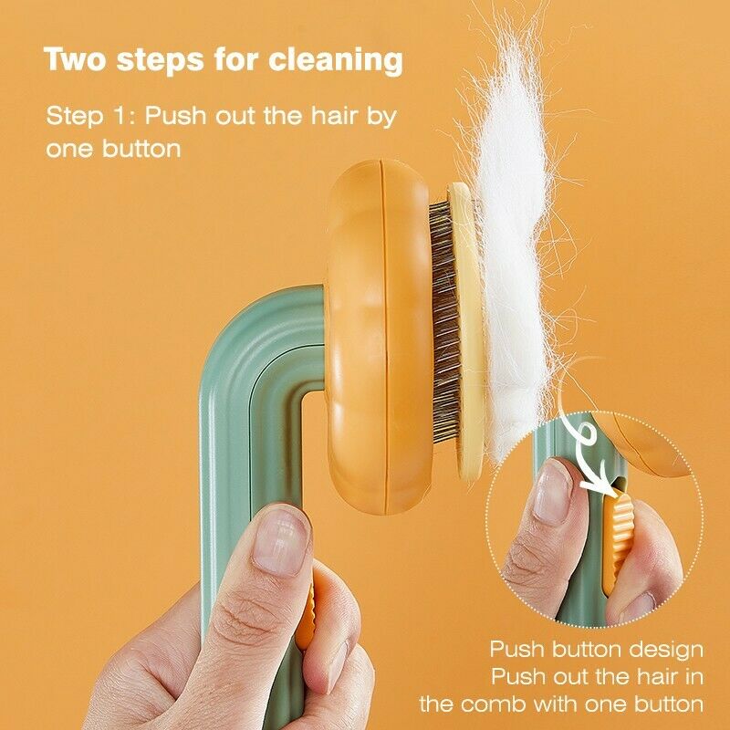 Pet self-cleaning slicker brush showing one-button hair release from orange bristle pad