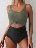 Olive and black one-piece swimsuit with tie-front waist and contrast belly panel