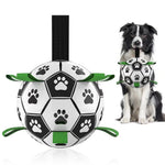 Inflatable dog soccer ball toy with paw print panels and green fabric tabs