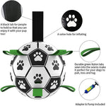 Inflatable dog soccer ball toy with paw prints, black tab, and valve hole