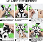 Inflatable dog soccer ball toy with paw prints, green tabs, and inflating needle
