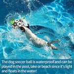 Inflatable dog soccer ball toy with paw print design and green tabs in water