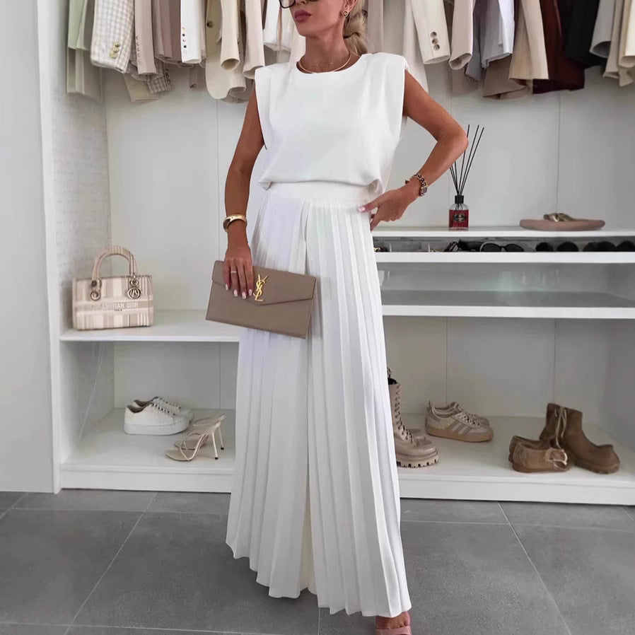 White sleeveless top and pleated wide-leg trousers set