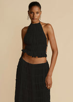 Black halter crop top and tiered pleated maxi skirt set with ruffled neckline