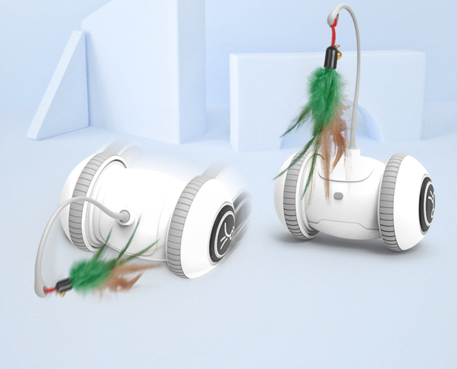 Interactive cat toy robot with white wheels and feather wand