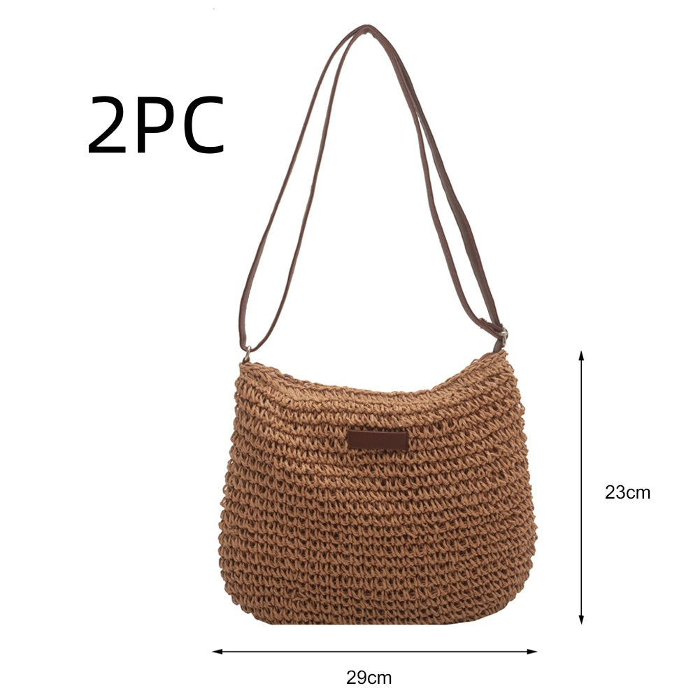 Woven straw medium shoulder tote bag with top zipper, tan-brown, curved hobo shape