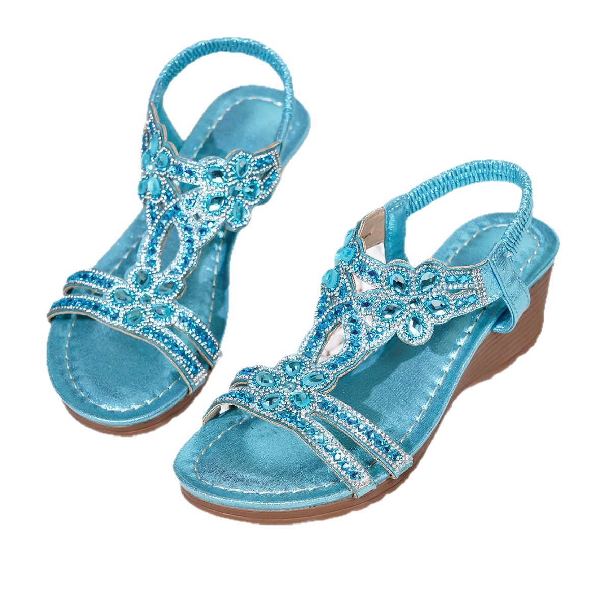 Blue wedge sandals with jeweled T-strap and elastic ankle band, open toe