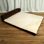 Cream pet dog bed with dark brown ribbed bolster and plush sleeping mat