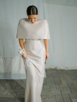 Satin cape-style top and fitted maxi dress, short sleeves, draped ivory skirt