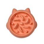 Orange slow feeder pet bowl with raised anti-gulp ridges and circular nubs