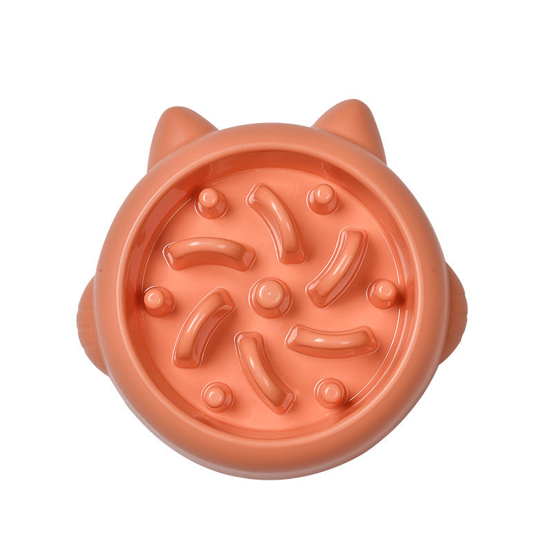 Orange slow feeder pet bowl with raised anti-gulp ridges and circular nubs