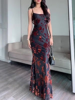 Black floral fitted maxi dress with spaghetti straps and long slit hem