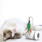 Interactive cat toy robot with green and tan feather wand