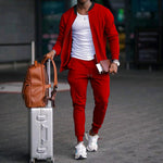 Men's zip-up long sleeve jacket and drawstring sweatpants set in red, with tapered legs