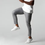 Gray slim fit business suit pants with button waistband and straight tapered legs