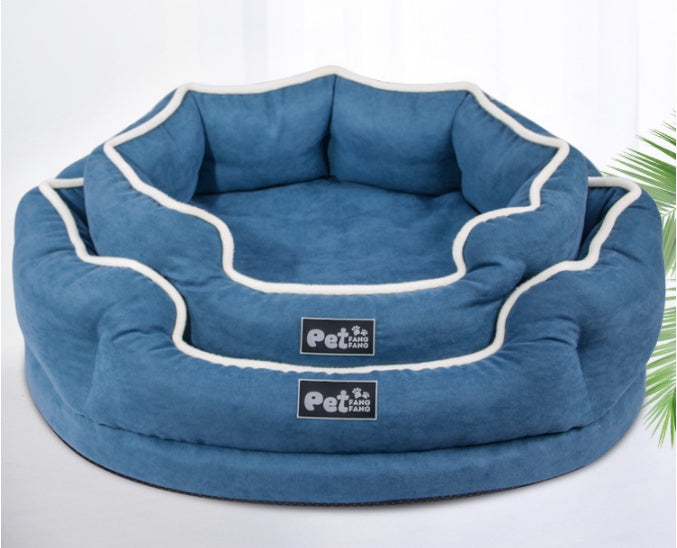 Blue removable pet bed mattress with white piping and interior cushion, logo patch