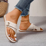 Women’s flat heel leisure slippers in white with open toe, buckle strap, and ankle chain