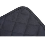 Black dog car seat cover corner with textured quilted fabric and stitched border trim