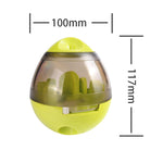 Green pet food dispenser ball with clear mid section and internal treat maze