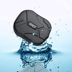 Waterproof black KSTSTAR GPS tracker with droplets splashing around