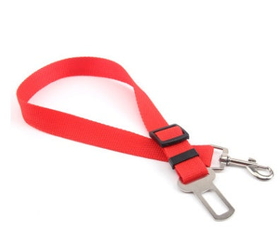 Adjustable dog car seat belt strap in red with metal clips and buckle adjuster.
