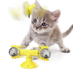 Yellow windmill-style cat toy with two clear spinning bulbs and a spring pole
