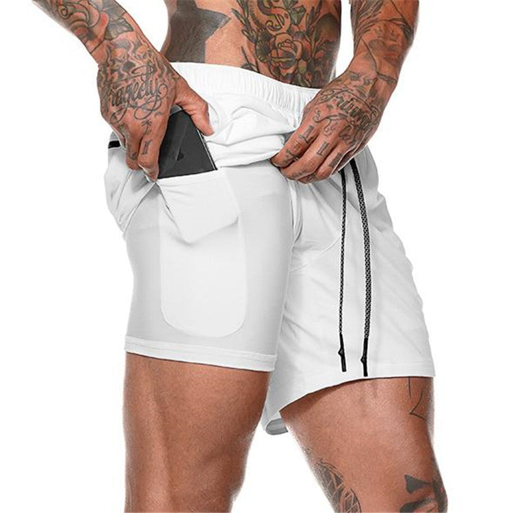 White compression sports shorts with drawstring and side pocket detail