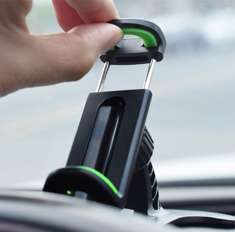 Car phone holder release lever and cradle, hand pressing green button, black