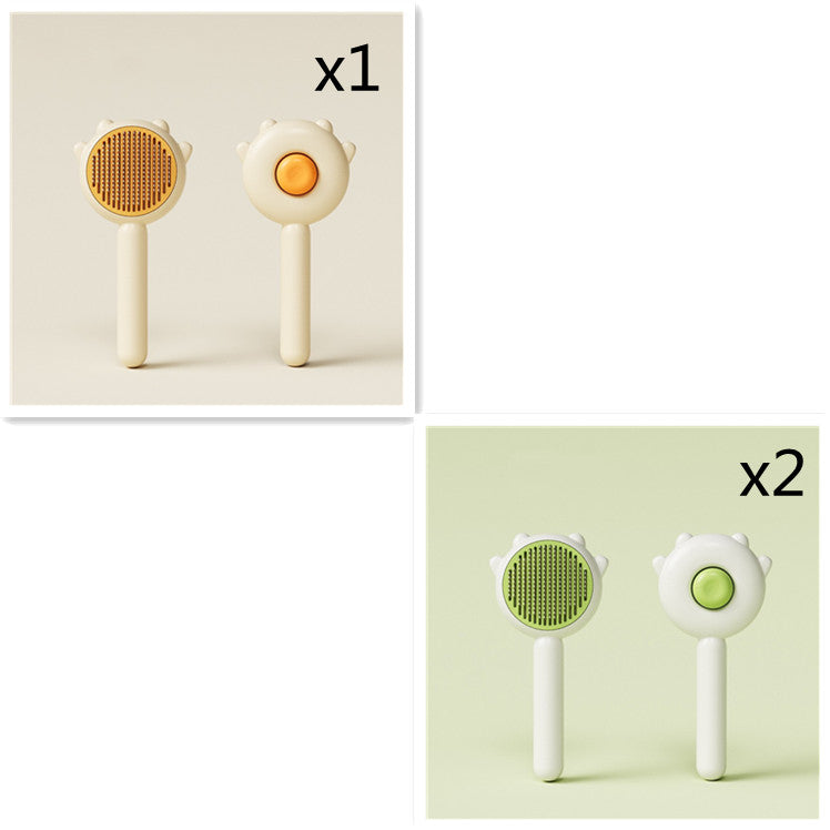 Pet grooming massage comb set with orange and green round bristle brushes on white handles