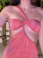Shiny pink cutout slit maxi dress close-up of twisted halter bust and glitter texture