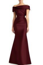 Off-shoulder pleated maxi dress in wine red satin with draped fold bodice and long fitted skirt
