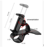 Car phone holder with suction-style base and cradle, dark plastic with green accents
