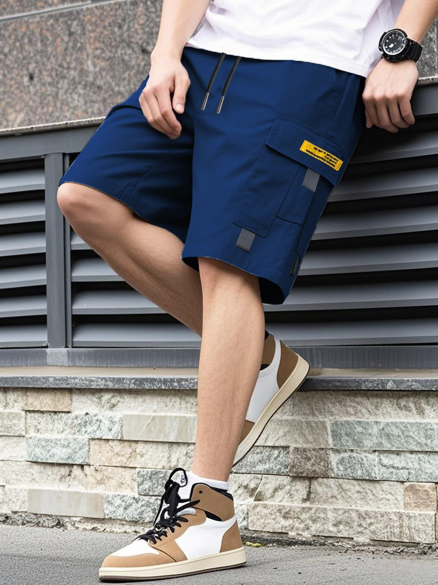 Men's navy utility shorts with drawstring and large side cargo flap pocket