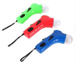 Three colorful treat launcher toys—green, red, and blue—with black trigger panels.