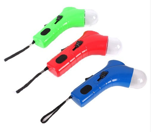 Three colorful treat launcher toys—green, red, and blue—with black trigger panels.