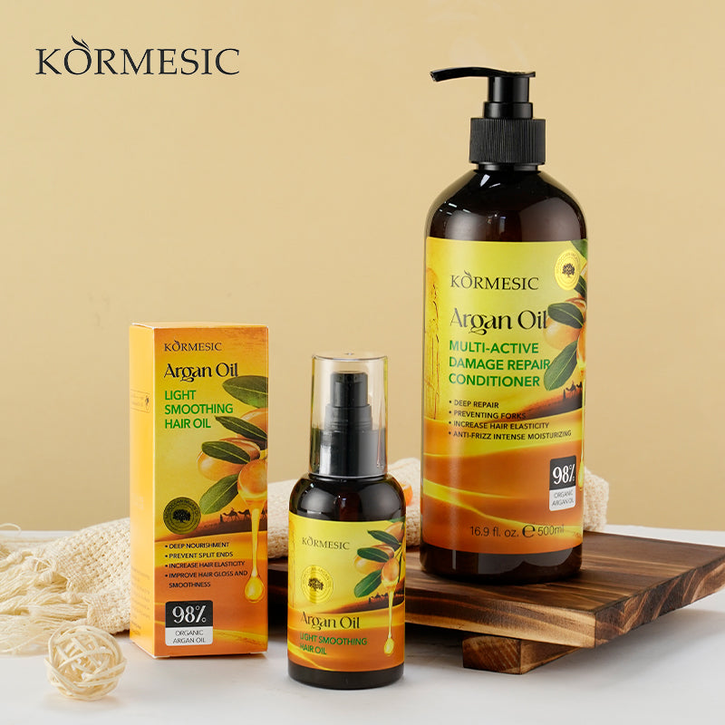 Argan oil hair oil set with pump bottle, mini bottle, and box packaging