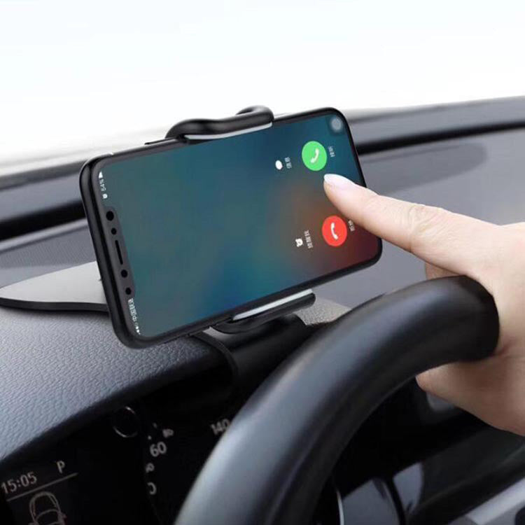 Car phone holder cradle holding a smartphone on dashboard, black frame